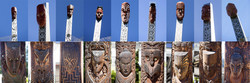 Роторуа (Rotorua). Вырезанные из дерева лица на входе в парк Te Puia.